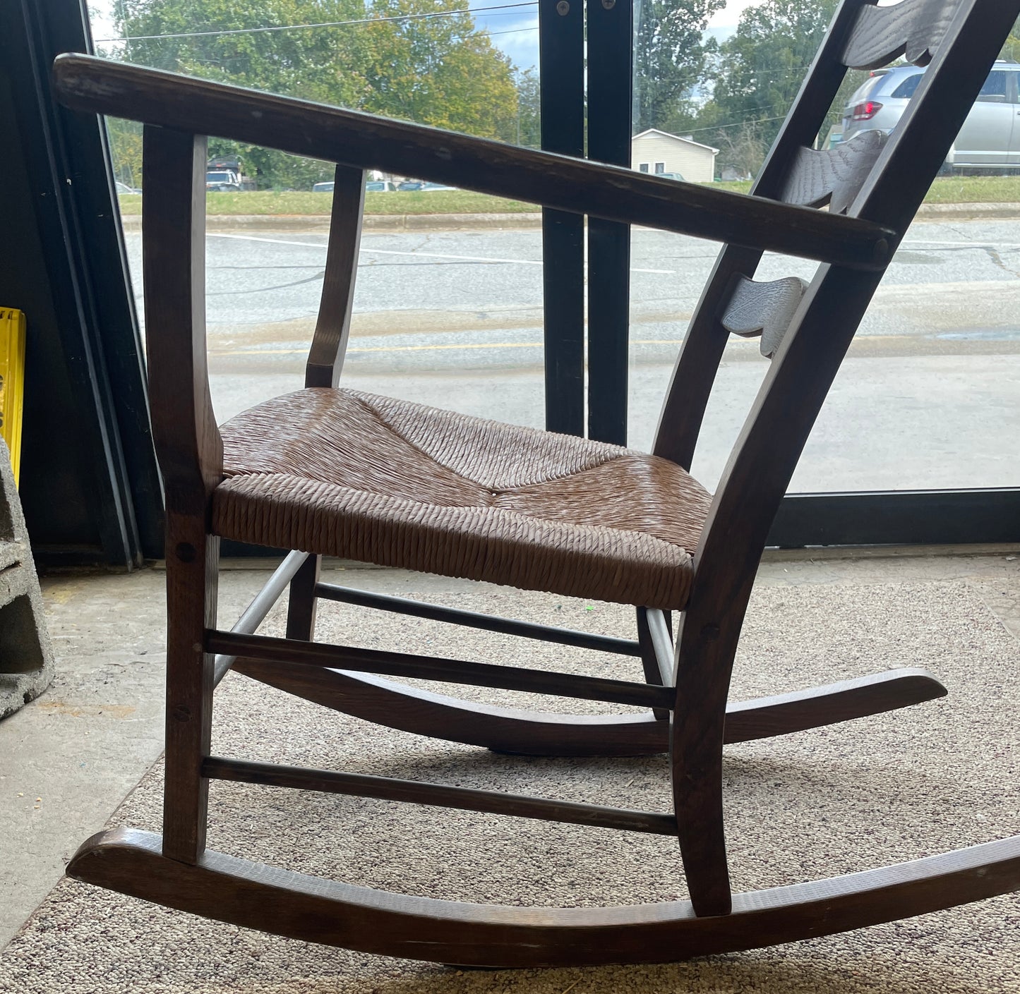 Wooden Ladder Back Rocking Chair with Straw Seat, 1950s