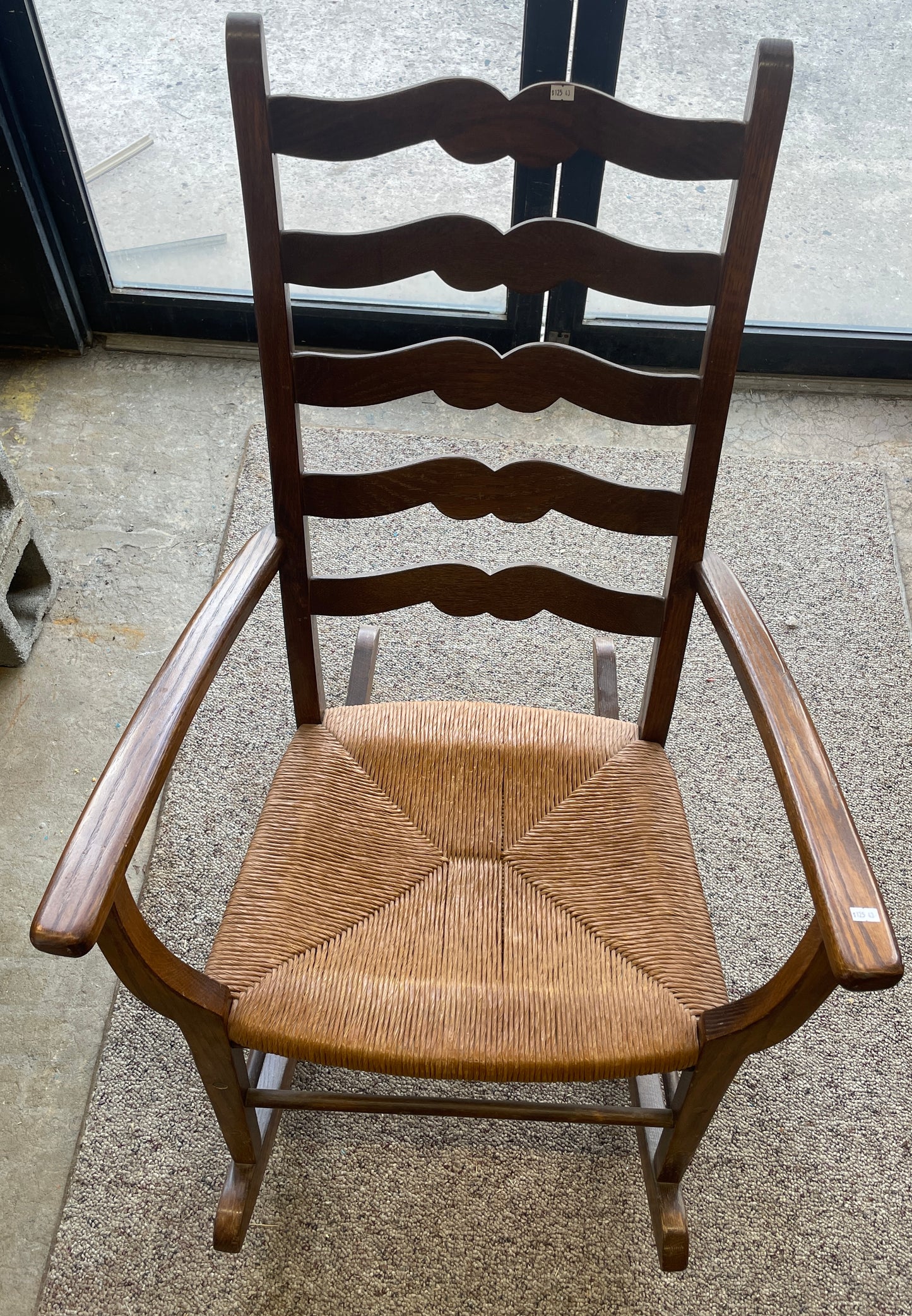 Wooden Ladder Back Rocking Chair with Straw Seat, 1950s